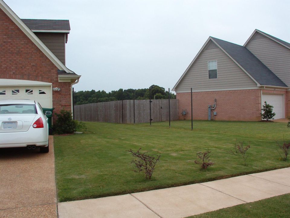 I had originally planned to replace the boards on the neighbor's fence with 8-footers, but since he's planning on selling soon, we decided not to.