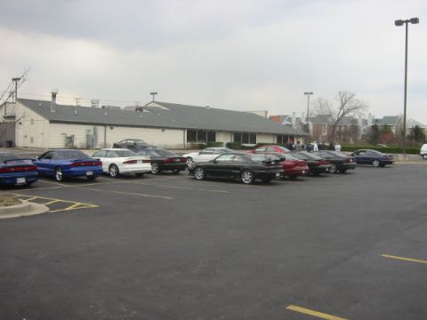 1993 Ford Probe - A group of 1993 Ford Probes gathered in a parking lot.