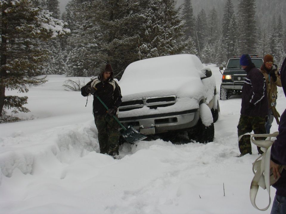 Starting the digging process.  Notice me and my helpful nature standing to the side holding my tow strap.