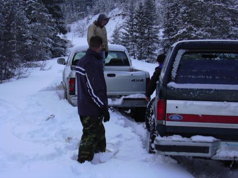 1990 Ford Bronco - The second stuck... 50 feet from the first, on the opposite side of the road. Me trying to get the bronco around him to pull from the front.