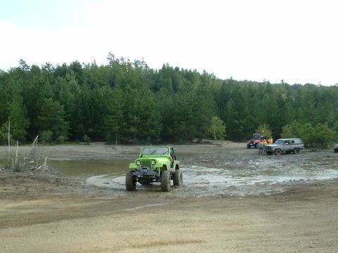 1991 Ford Bronco - Green machine in the mud