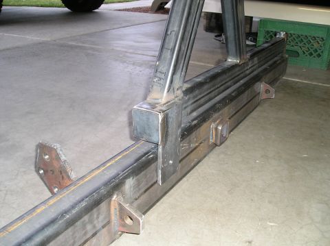 1993 Ford Bronco - Close-up view of a custom-fabricated metal bumper, showing the welding and mounting points.