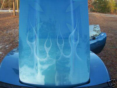 1993 Ford Bronco - Custom flame graphics on a car hood.