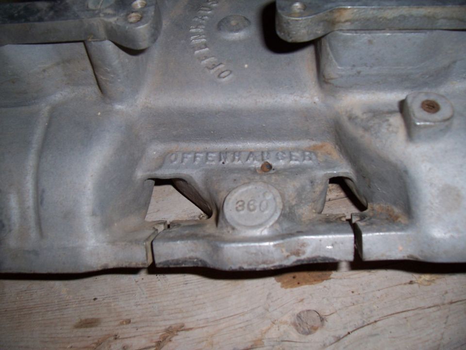 Close-up of an Offenhauser intake manifold with a "360" marking