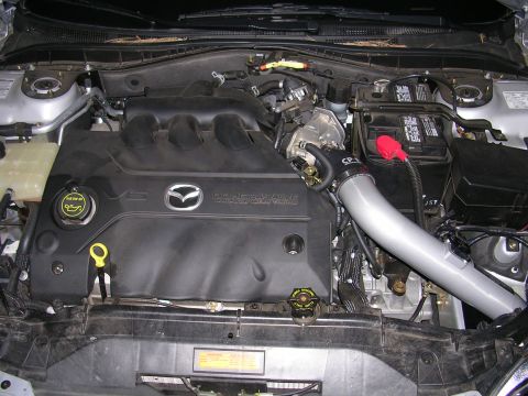 2004 Mazda 6 - The engine bay of a 2004 Mazda 6 is visible, displaying the V6 engine and associated components.