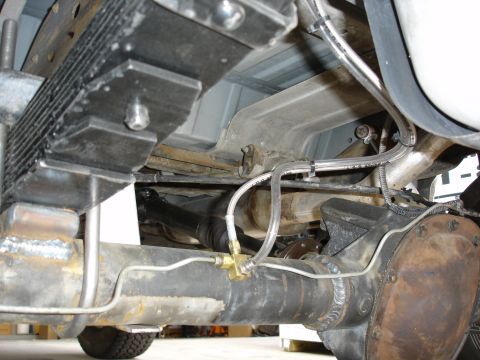 1996 Ford Bronco - Extended breather line on rear axle. Also you can see the extended stainless steel brake line. I only did the front and rear diffs for now.…