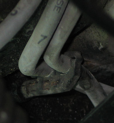 1994 Ford Bronco - Ignition wires and bracket detail, with partial text visible on the wires.