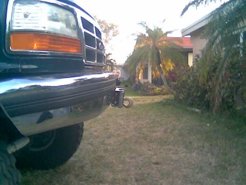 1992 Ford Bronco - Front view of a 1992 Ford Bronco, a chrome bumper and an installed winch hook.