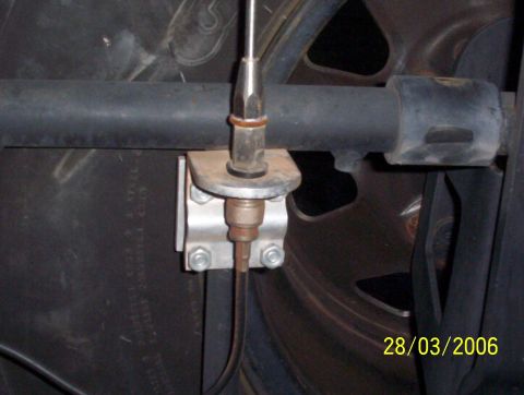 1991 Ford Bronco - Close-up view of an antenna mount on a vehicle's spare tire assembly.
