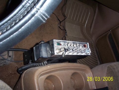 1991 Ford Bronco - Interior view of a vehicle showing a CB radio and part of the dashboard.