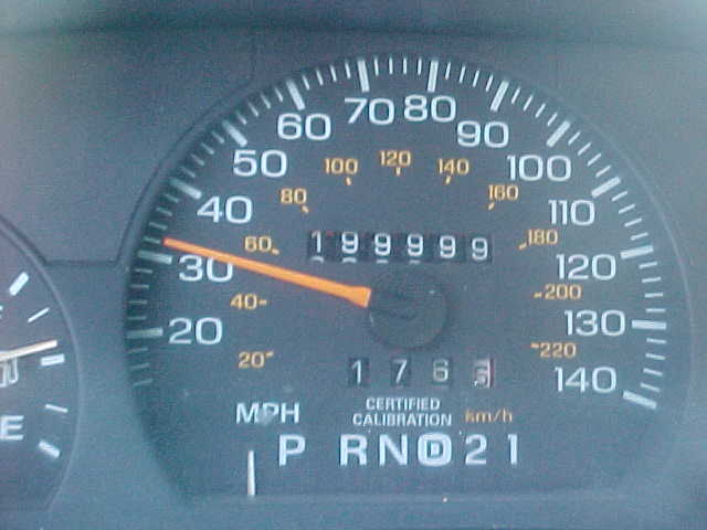Speedometer reads 30 MPH, odometer shows 199999. Gear selector shows P R N D 2 1