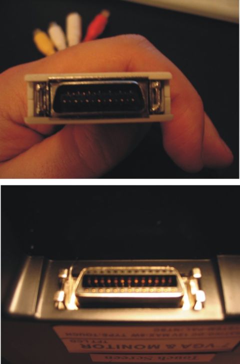 1993 Ford Probe - A connector with pins is shown, with text and a website address visible on a label below it.
