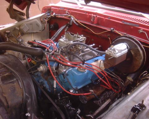 1978 Ford Bronco - Close-up view of an engine bay with various components visible.