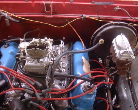1978 Ford Bronco - Close-up view of the engine bay of a 1978 Ford Bronco, highlighting the V8 engine components.
