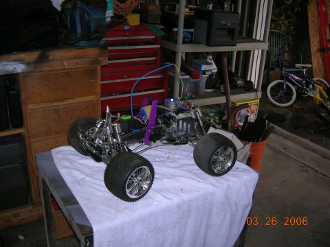 1985 Ford Bronco - A remote control monster truck sits on a table, ready for modification or repair.