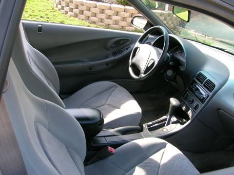 1997 Ford Probe - Interior view of a 1997 Ford Probe, highlighting the seats and dashboard.