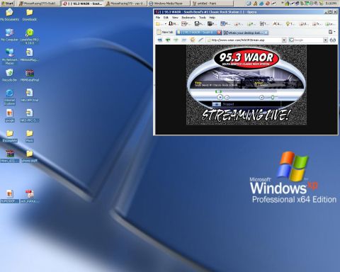 1985 Ford F-150 - A computer screen displays a radio station's website, showing it is streaming live.