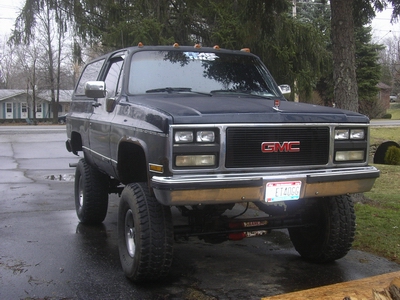1989 GMC Jimmy - This 1989 GMC K5 Blazer is modified with large off-road tires and a lifted suspension.