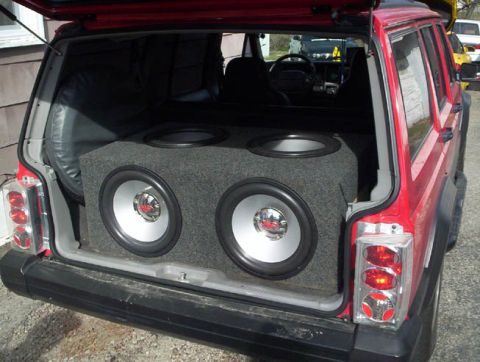 1994 Ford Probe - custom sealed box 2 chambers, 2 subs in each chamber 4 - 15" Rockford HE2 subs