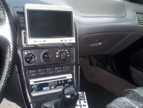 1994 Ford Probe - flip out tv with dvd player custom mounted in dash