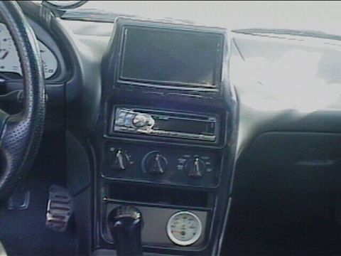 1994 Ford Probe - 7" tv molded into center console-fiberglassed