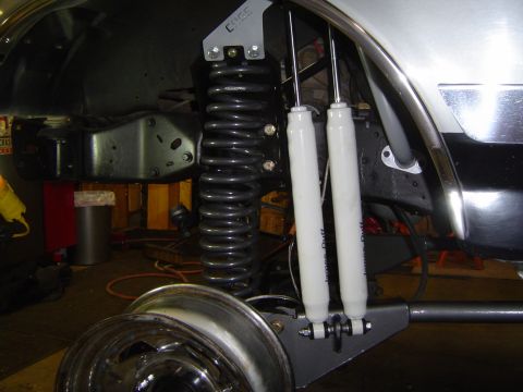 1989 Ford Bronco - New shocks and coil spring installed on the vehicle's suspension system.