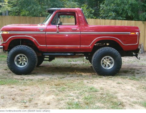 1978 Ford Bronco - Bright red (viper or victory red) with only the top strip of chrome