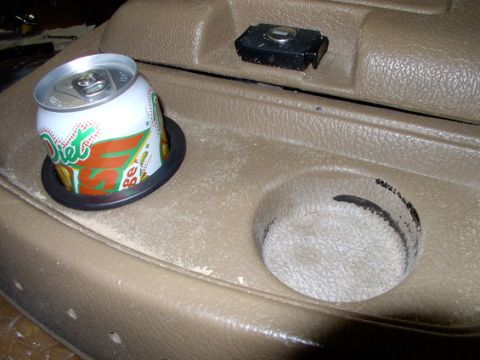 1978 Ford Bronco - Center console interior with a soda can in a cup holder.