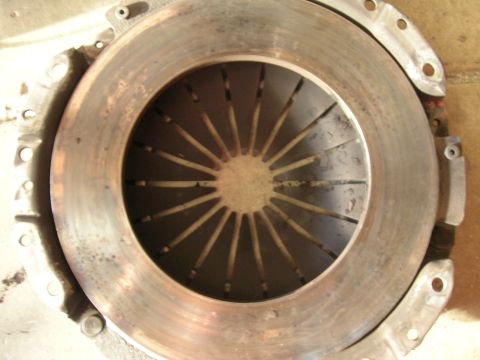 1979 Ford Bronco - Close-up view of a clutch pressure plate, a critical component in a vehicle's drivetrain.