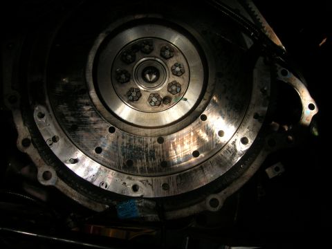 1979 Ford Bronco - A detailed view of a vehicle's flywheel and clutch mechanism, showing mechanical components.