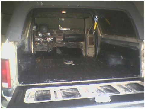 1981 Ford Bronco - Rear view of a 1981 Ford Bronco showing the cargo area and dashboard.