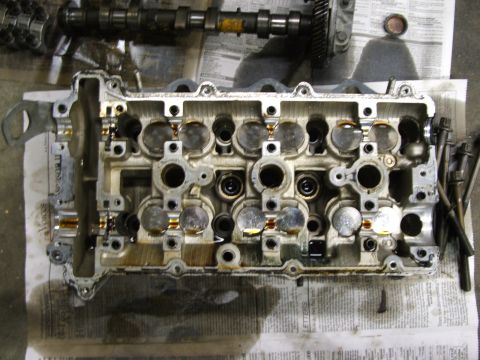 1996 Ford Probe - Engine cylinder head and camshaft removed for repair or maintenance.