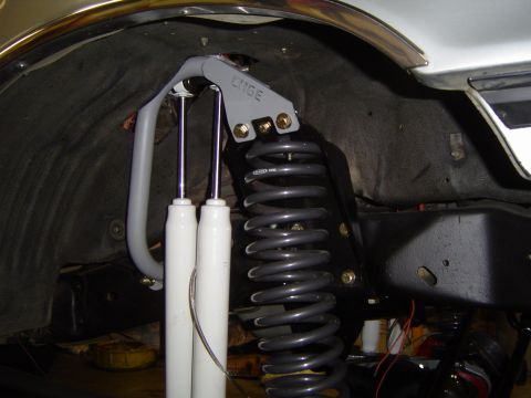 1989 Ford Bronco - Passenger side mounted. had to cut deeper into the wheelwell for this side as the plastic liner is shaped differently