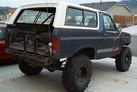 1986 Ford Bronco - This lifted 1986 Ford Bronco is equipped with large off-road tires and a custom rear setup.