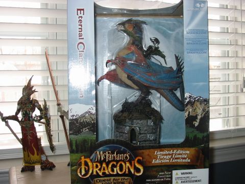 1991 Ford Bronco - McFarlane's Dragons toy packaging a dragon and a warrior figure.