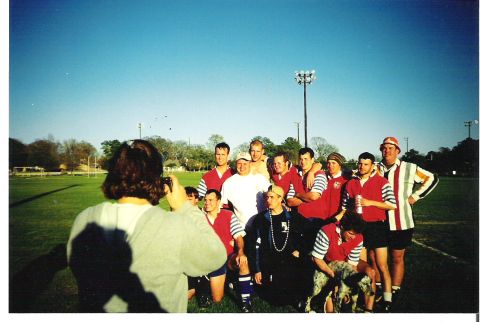 1992 Ford Bronco - A group of men in rugby uniforms gather for a team photo on a sunny day.