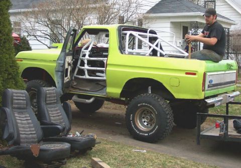 1978 Ford Bronco - This modified 1978 Ford Bronco is undergoing some work, with its interior seats removed and a rollcage installed.