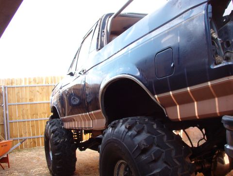 1994 Ford Bronco - The truck was damaged when it was driven slowly along the edge of a packed parking lot during a light rain. An adjacent construction site h…
