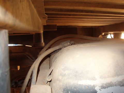 1994 Ford Bronco - The fuel pump is just behind the bed floor reinforcement for the body mounts.