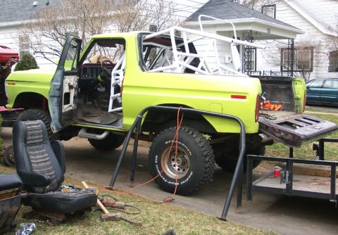 1978 Ford Bronco - This 1978 Ford Bronco is undergoing modifications with a prominent rollcage installed.