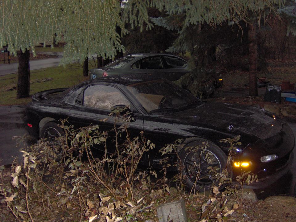 Black 1993 Mazda RX-7 parked outdoors, 3q-front view