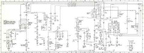 1974 Ford Bronco - Wiring diagram depicting headlight, ignition switch, and lamp circuits with connectors and coded conductors.