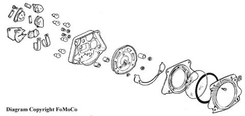 1974 Ford Bronco - Exploded parts diagram of a mechanical housing assembly with gaskets, plates and hardware.