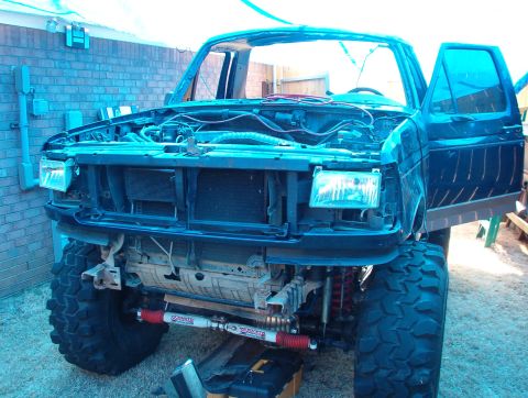 1994 Ford Bronco - The body is being emptied & stripped off piece by piece.