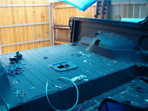 1994 Ford Bronco - The body is being emptied & stripped off piece by piece.