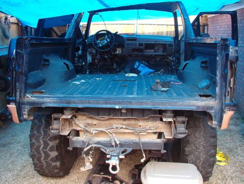 1994 Ford Bronco - The body is being emptied & stripped off piece by piece.
