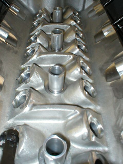 1990 Ford Mustang - Aluminum intake manifold detail showing ports and internal structure.