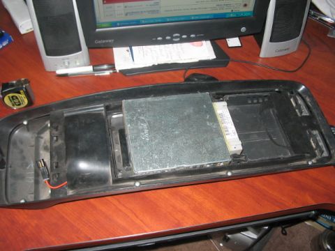 1991 Ford Bronco - A Ford electronic control unit is shown, likely removed from a vehicle for repair or modification.
