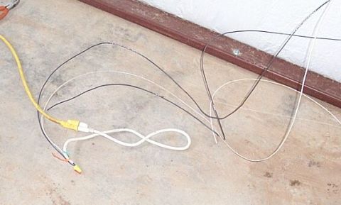 1986 Ford Ranger - Various wires and connectors are spread out on a concrete floor, with the SuperMotors logo visible in the lower right corner.