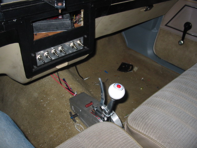 Interior with aftermarket shifter and toggle switches